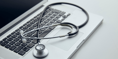Stethoscope on laptop