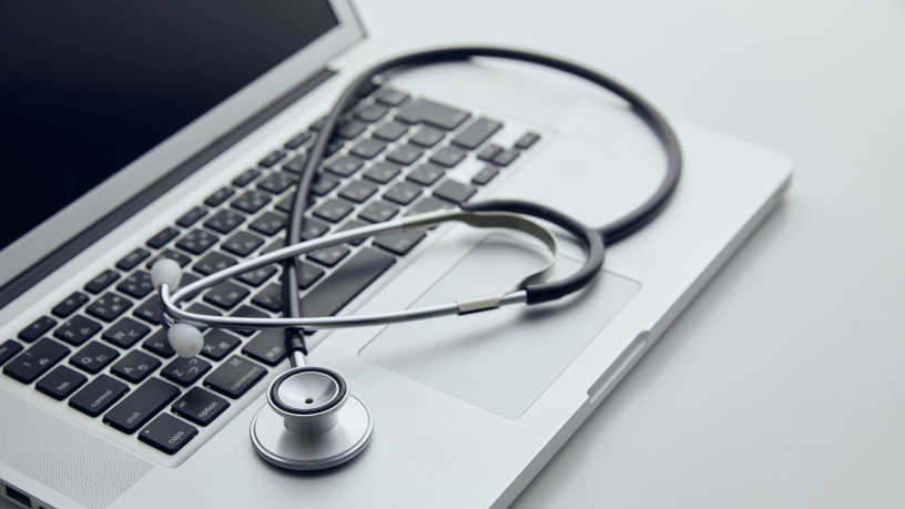 Stethoscope on laptop